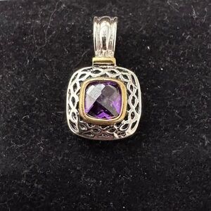 Intricate Silver and Gold Necklace with Purple Gemstone